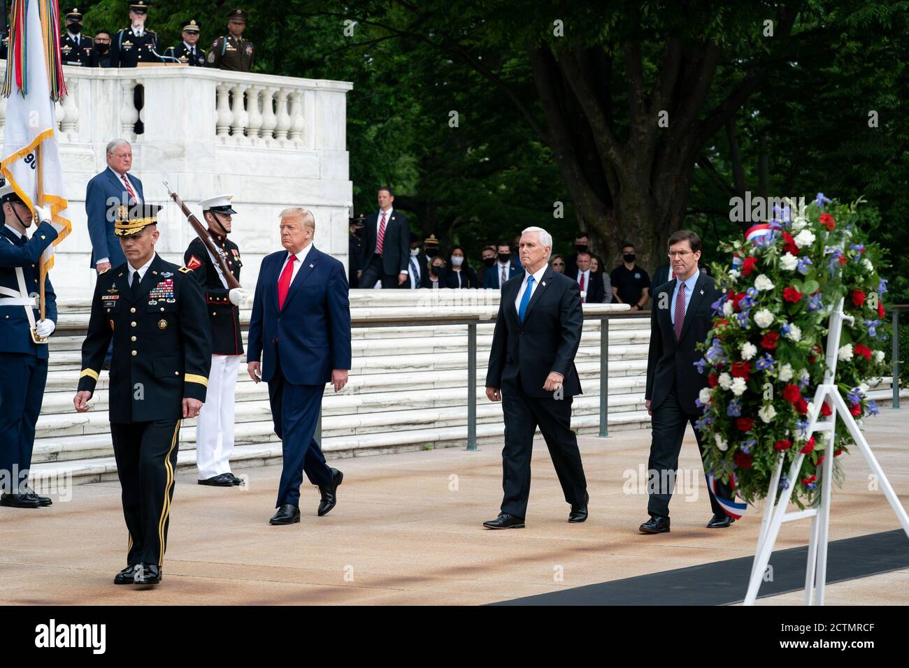 Memorial Day 2020. President Donald J. Trump, Vice President Mike Pence, Secretary of Defense Mark Esper and U.S. Army Gen. Omar Jones arrive to the Memorial Day wreath-laying ceremony at the Tomb of the Unknown Soldier at Arlington National Cemetery Monday, May 25, 2020, in Arlington, Va. Stock Photo