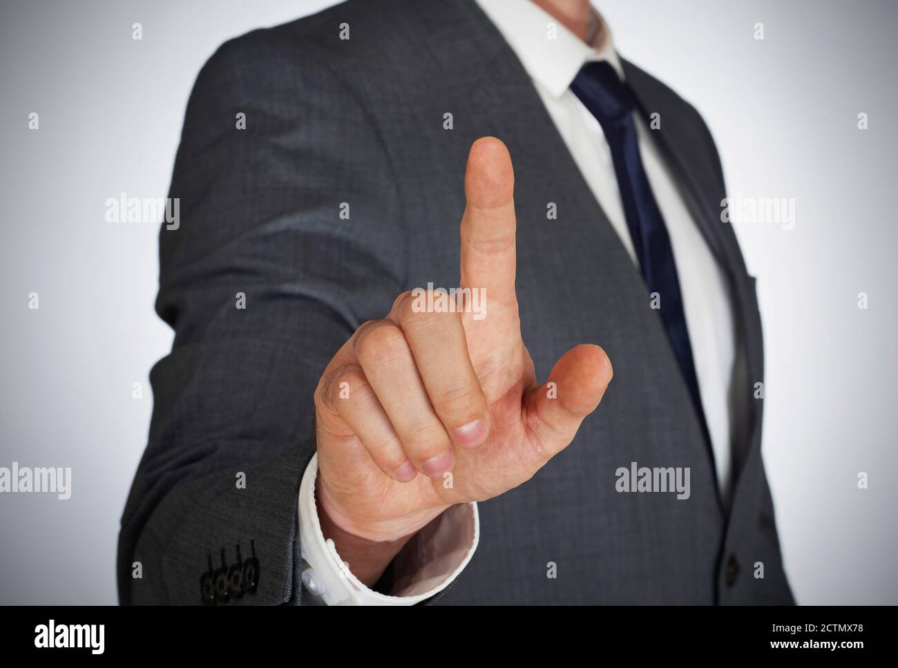 Hand touching virtual screen Stock Photo