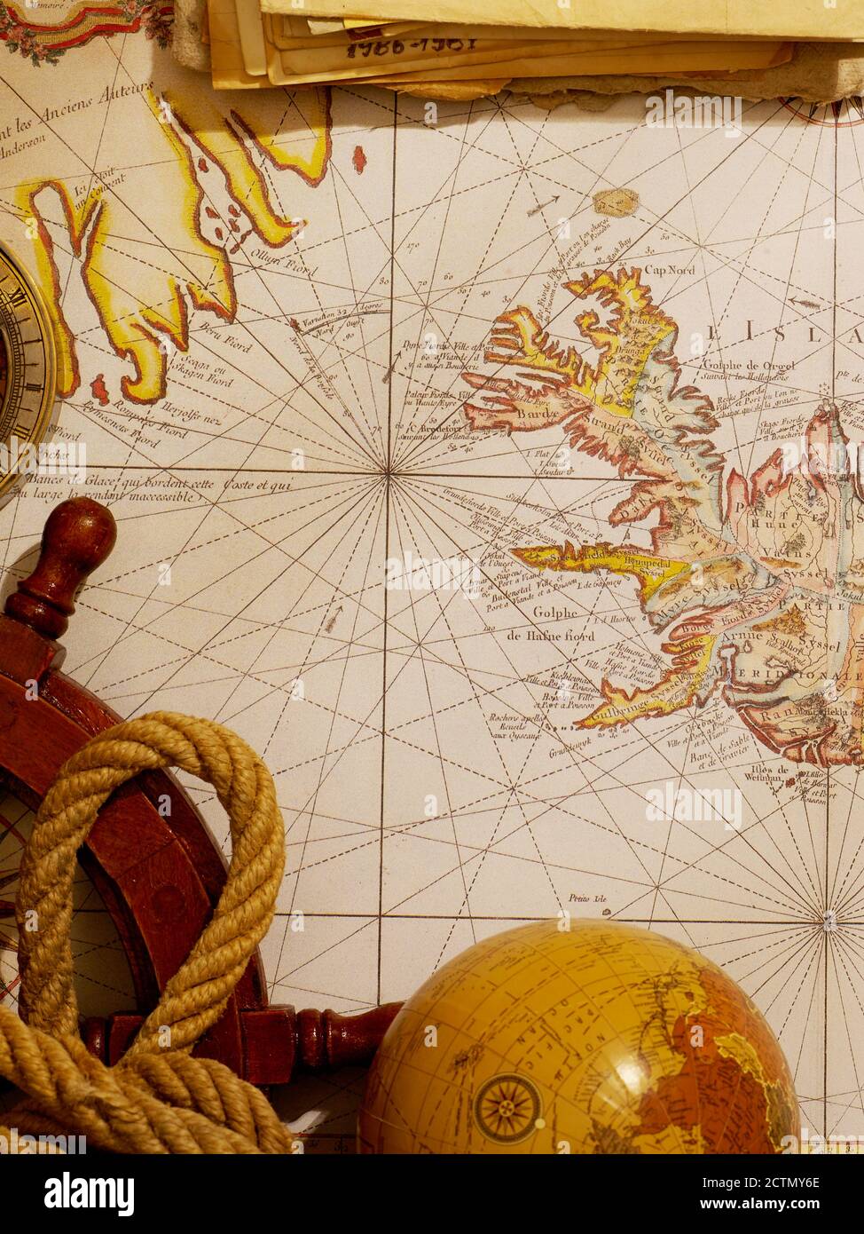 Marine equipment over old map from XVIII century Stock Photo - Alamy