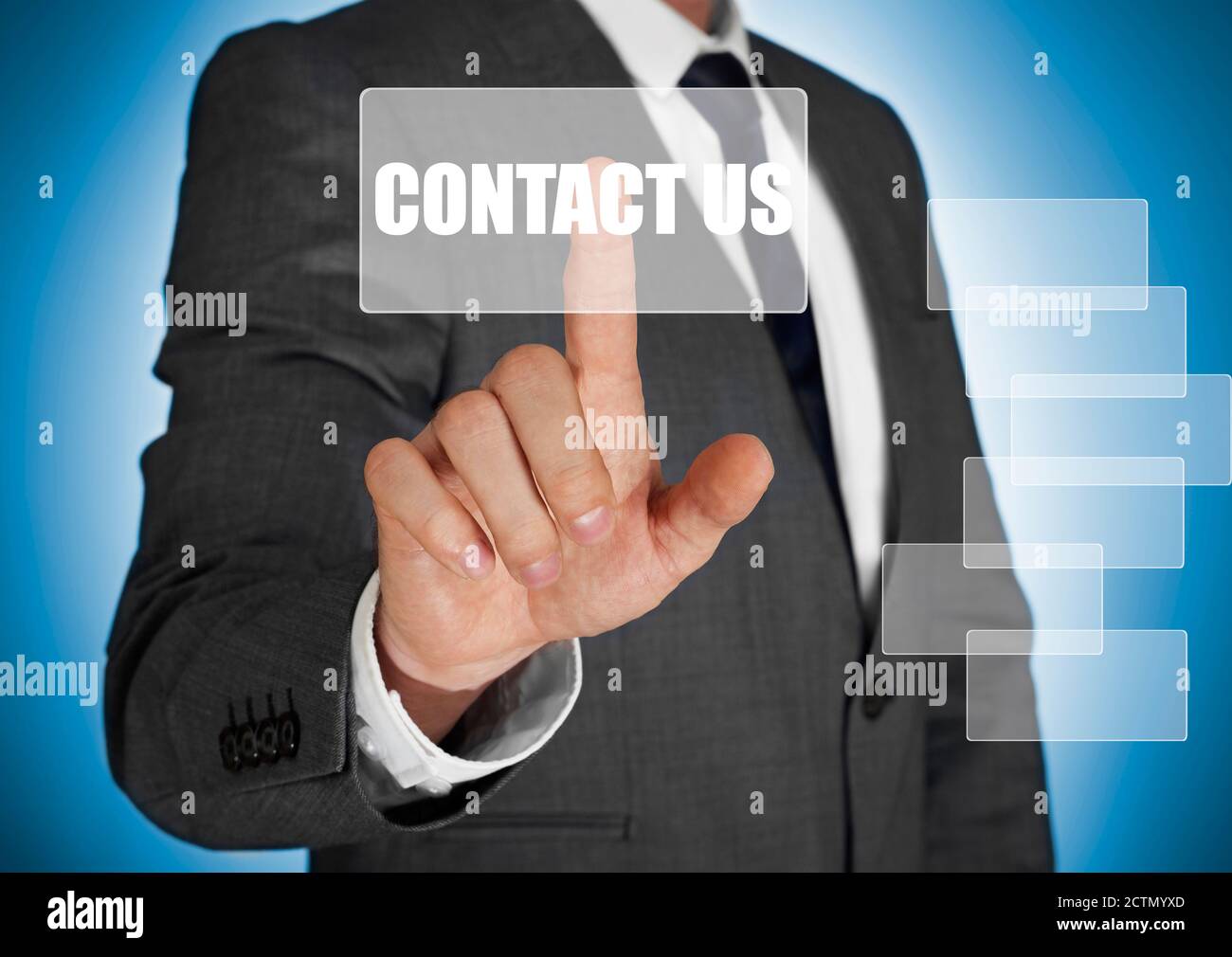 Businessman touching a contact us button Stock Photo