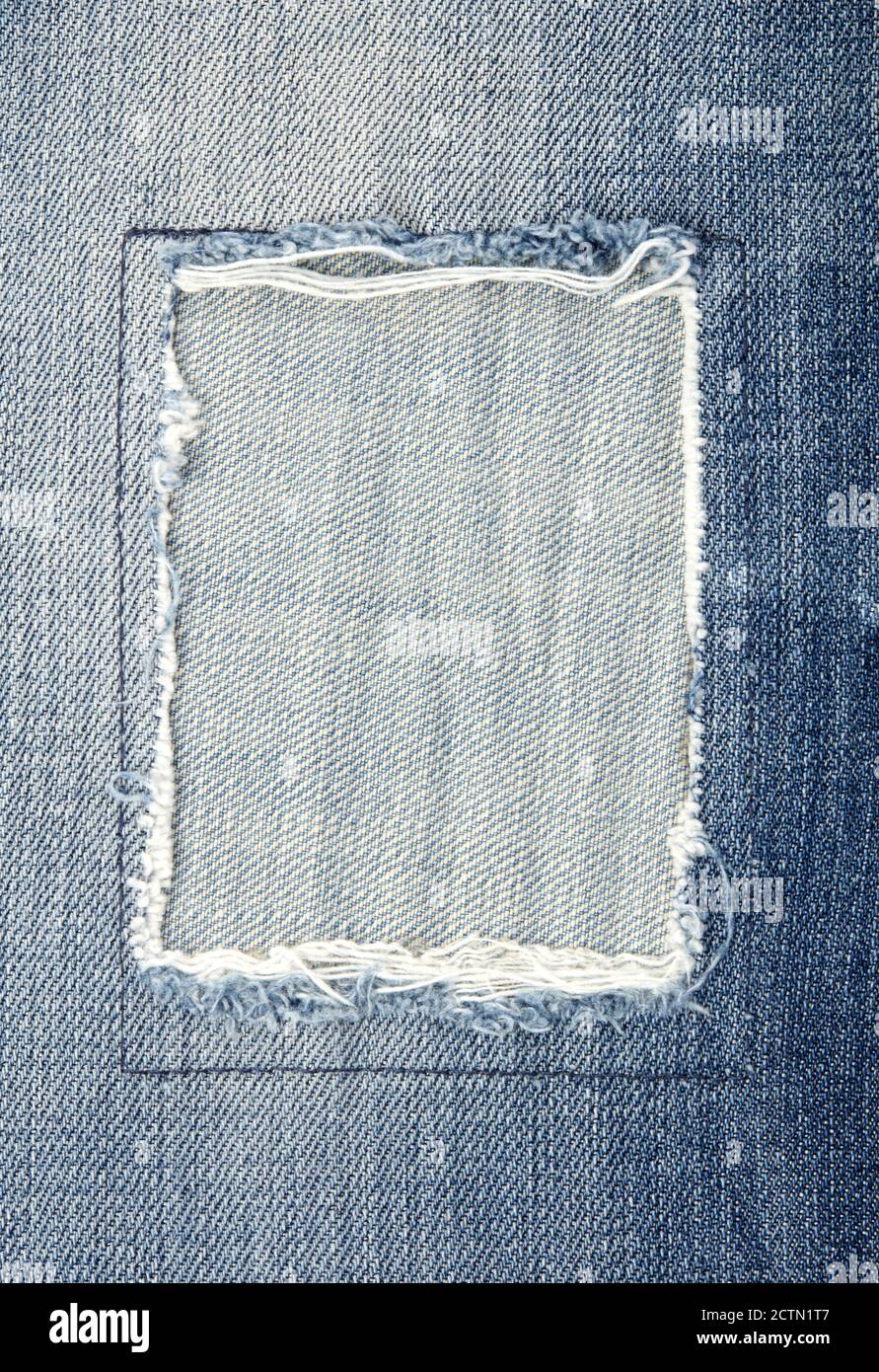 Patched jeans close-up Stock Photo