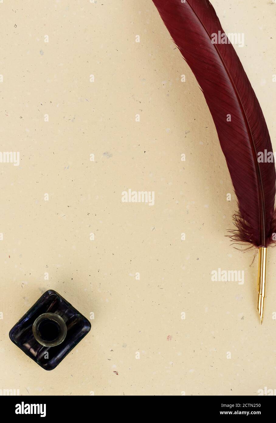 Quill, manuscript and ink well Stock Photo - Alamy