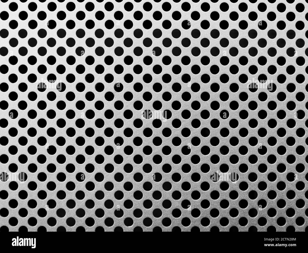 Perforated metal plate texture Stock Photo - Alamy
