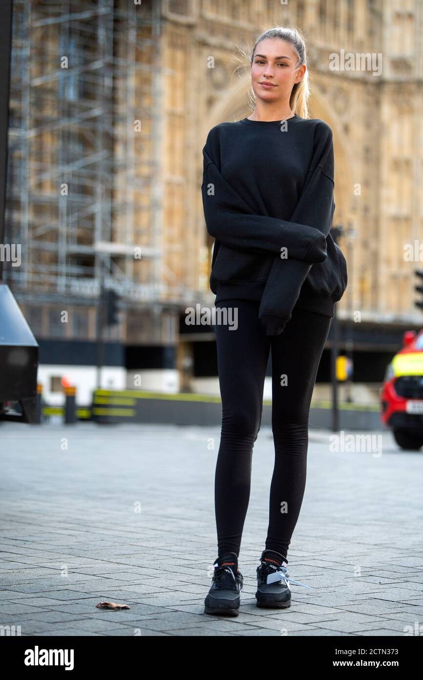 Love Island star Zara McDermott joins Refuge, a domestic violence charity, near Parliament Square in London to campaign for people threatening to share intimate images to be made a crime. Stock Photo