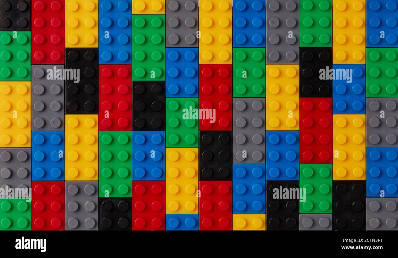 Plastic toy blocks on white background Stock Photo - Alamy