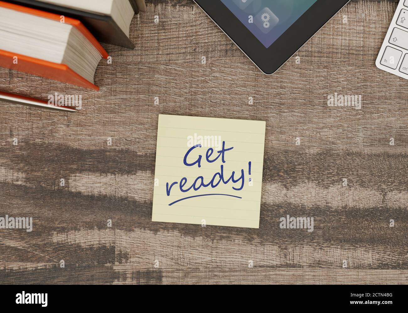 Get ready message on adhesive note on office table Stock Photo - Alamy