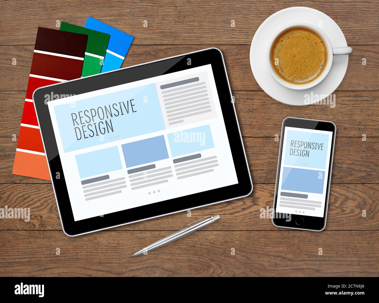 Responsive design on mobile devices on desk Stock Photo