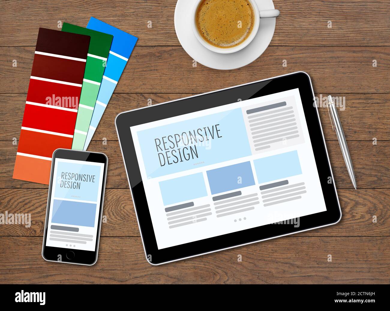Responsive design on mobile devices on desk Stock Photo