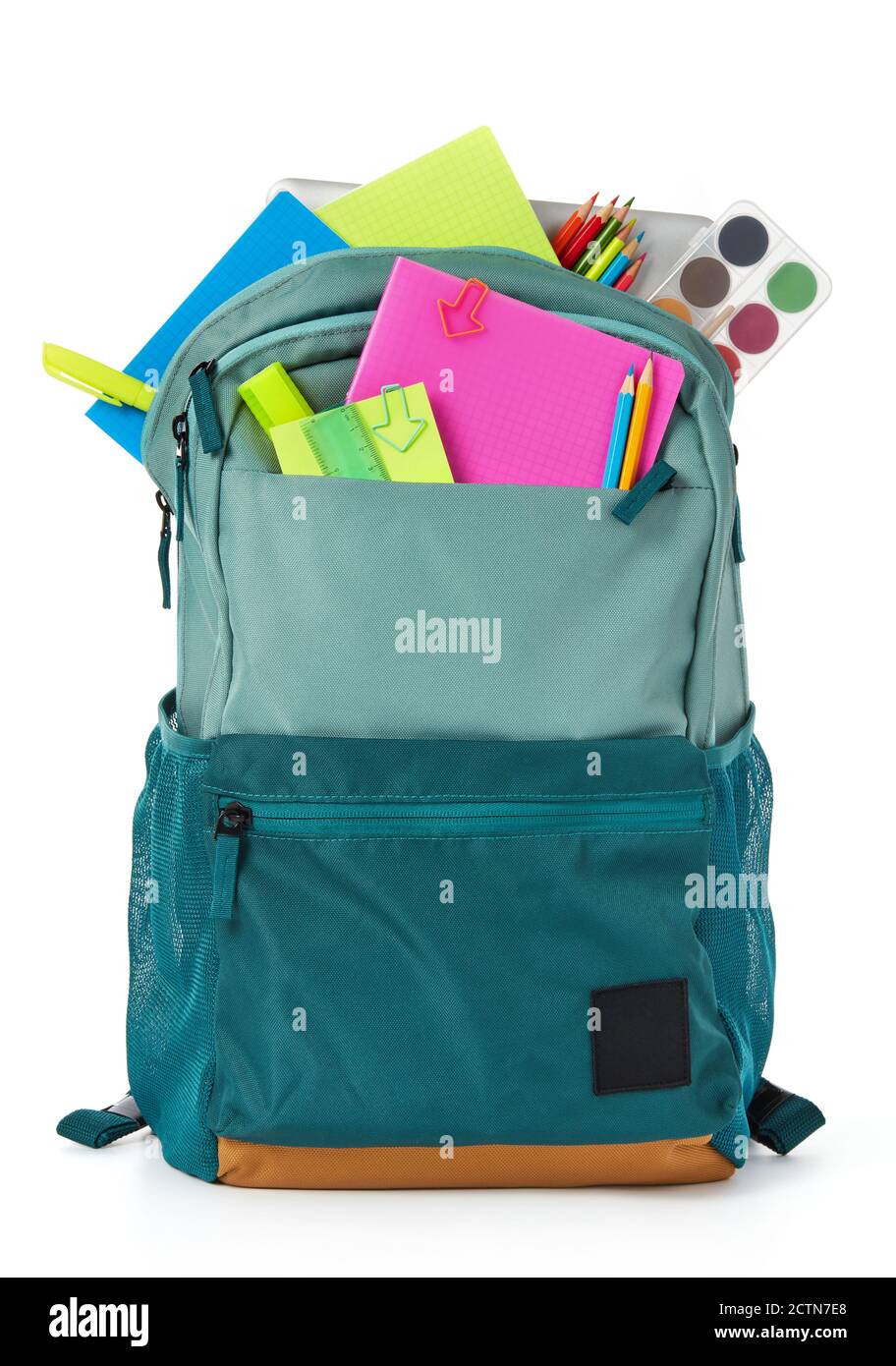 School supplies and backpack on white background Stock Photo