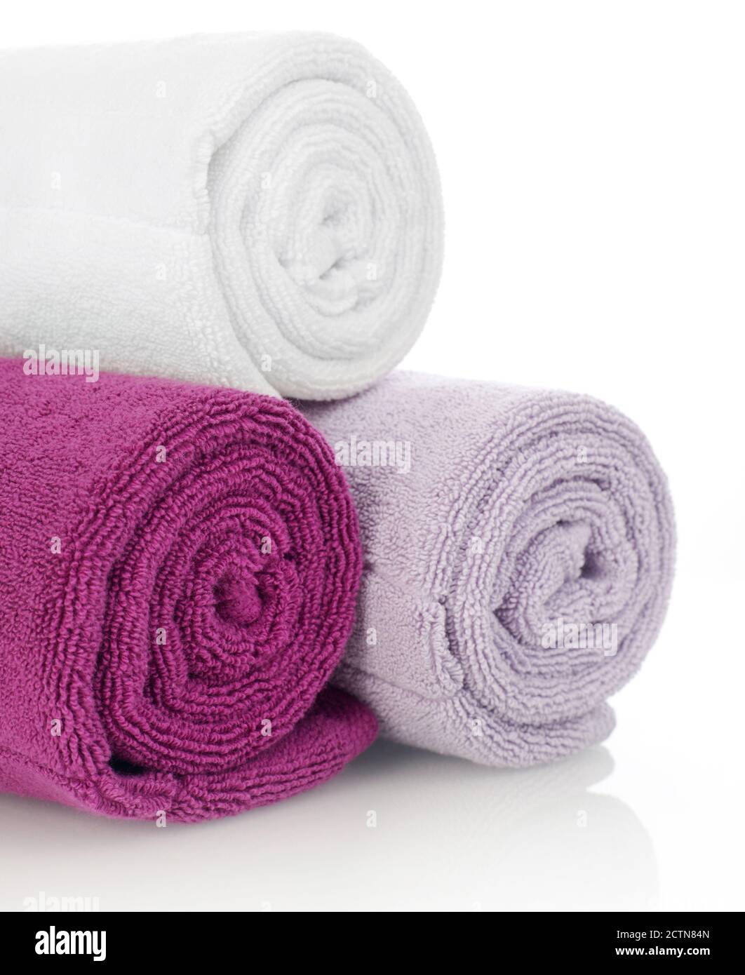Clean multi-colored towels isolated on white Stock Photo