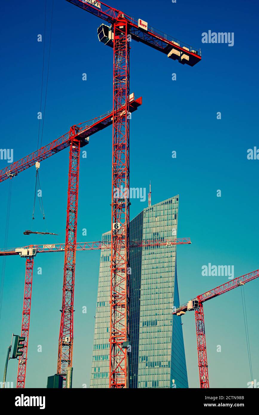 European Central Bank with construction cranes in the foreground Stock Photo