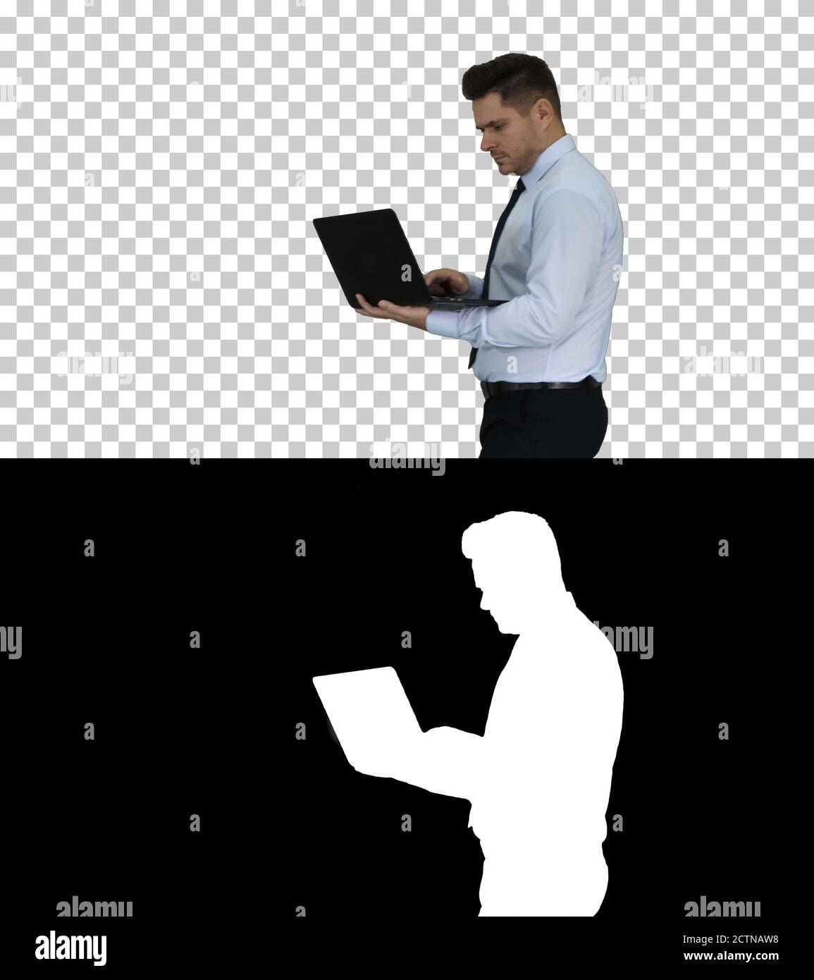 Formal man walking and using laptop, Alpha Channel Stock Photo