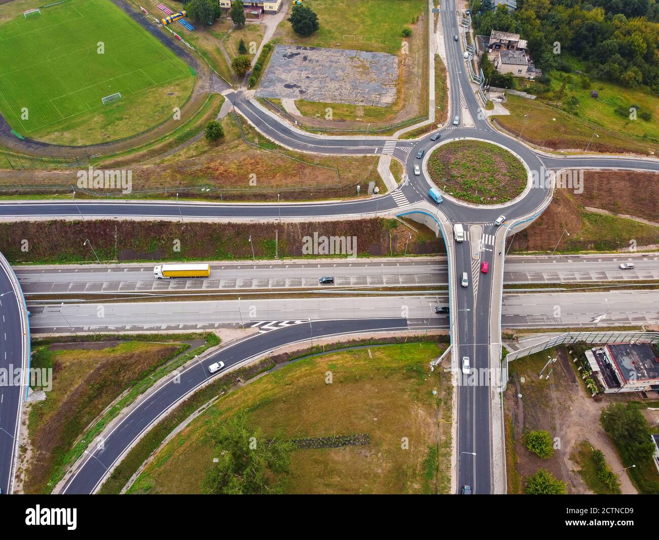 Road junction with roundabouts. Highway. Drone, aerial view. Stock Photo