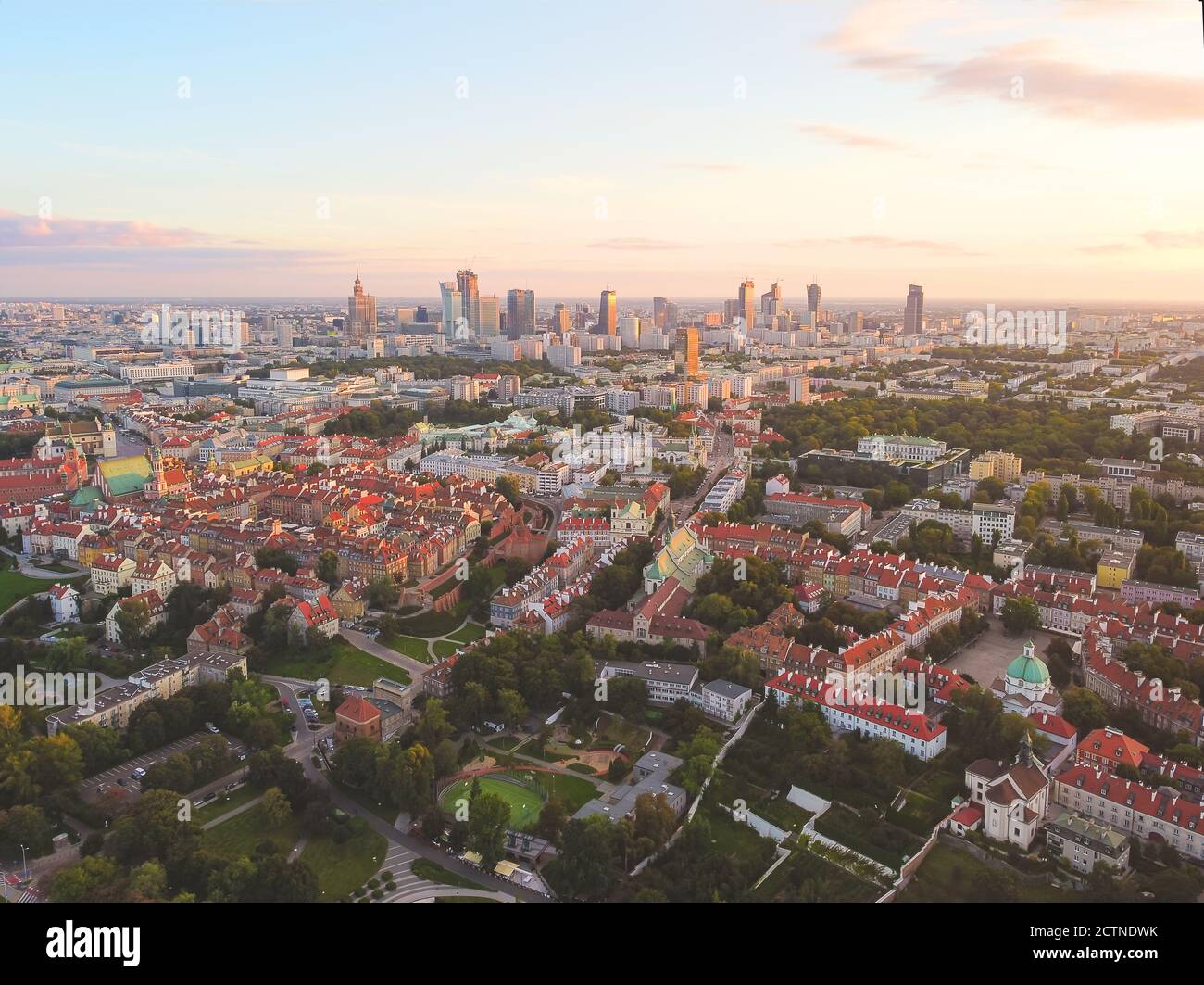 Old town with modern city downtown in a background. Drone, aerial view Stock Photo