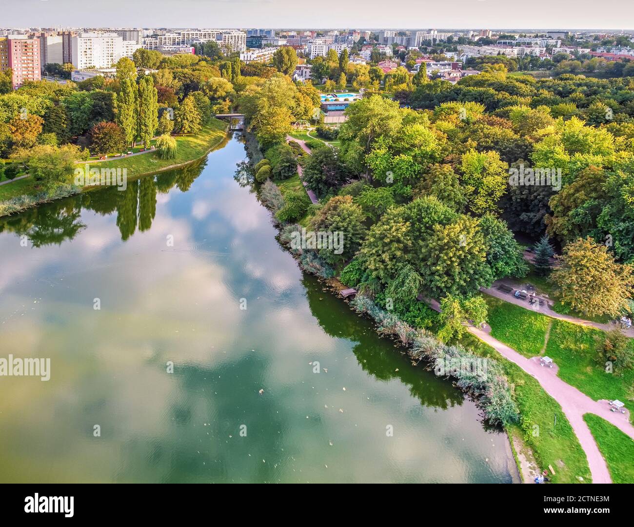 Park with large lake in the big, capital city. Drone, aerial view Stock Photo
