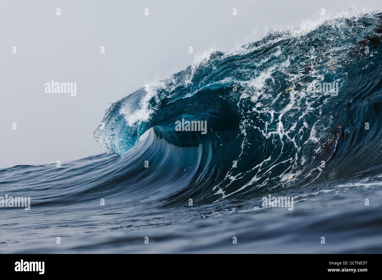 Powerful blue breaking ocean waves with white foam Stock Photo - Alamy