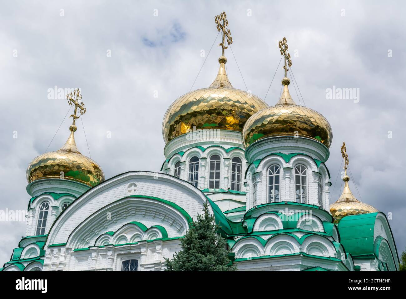 Raifa, Tatarstan, Russia – June 25, 2017.  Onion domes and crosses of the Holy Trinity Cathedral at the Raifa Monastery of the Mother of God. Stock Photo