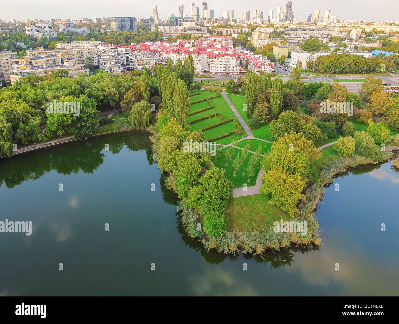 Park with large lake in the big, capital city. Drone, aerial view Stock Photo