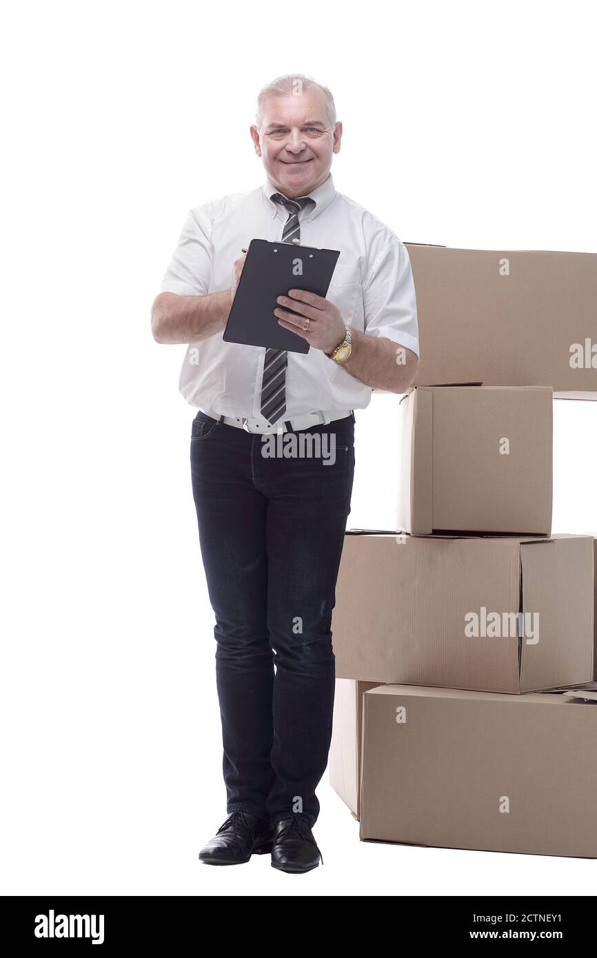 in full growth. smiling man signing for a good delivery Stock Photo - Alamy
