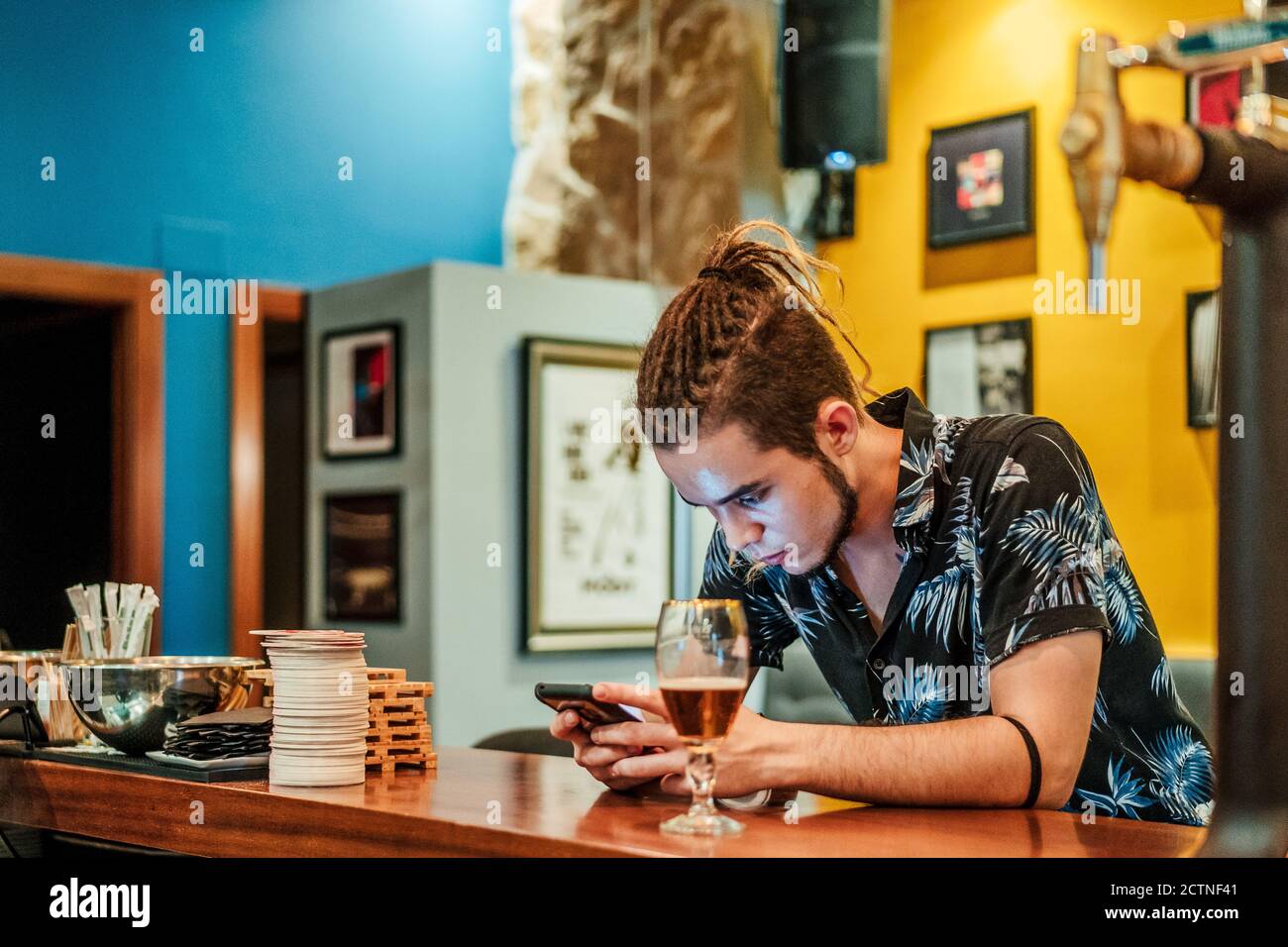 Bartender Leaning On Counter High Resolution Stock Photography and ...