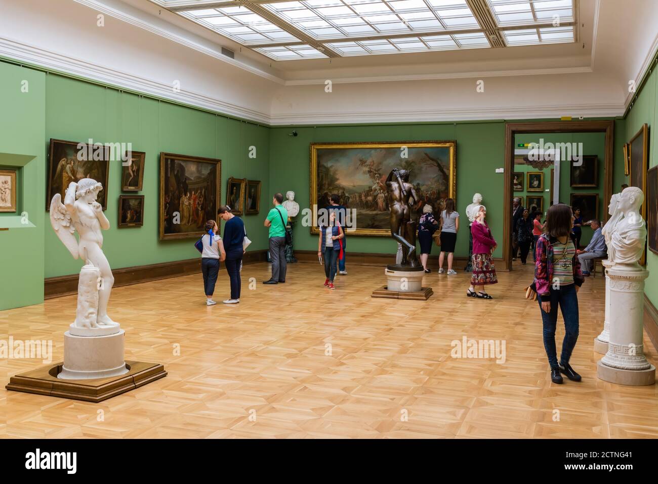 Moscow, Russia – July 1, 2017. Interior view of the Tretyakov Gallery in Moscow, with people, paintings and sculptures. Stock Photo