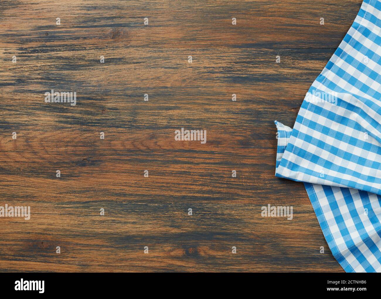 Tablecloth on wooden table Stock Photo