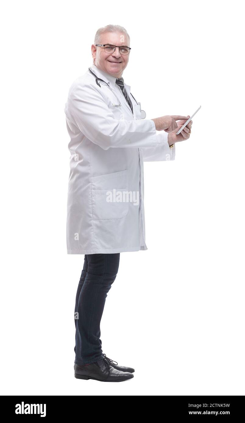 in full growth. smiling doctor using a digital tablet Stock Photo - Alamy