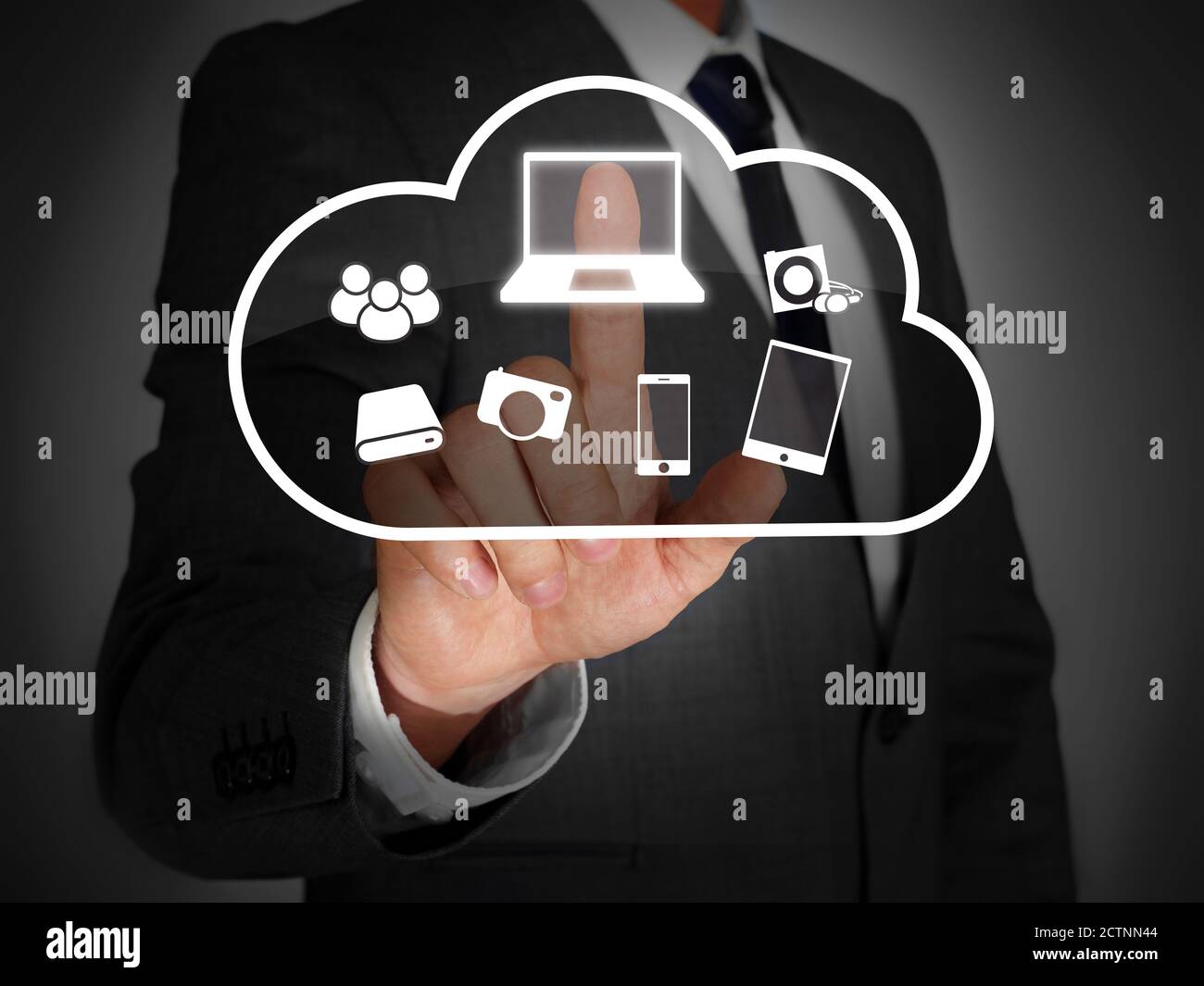 Businessman touching a virtual screen Stock Photo