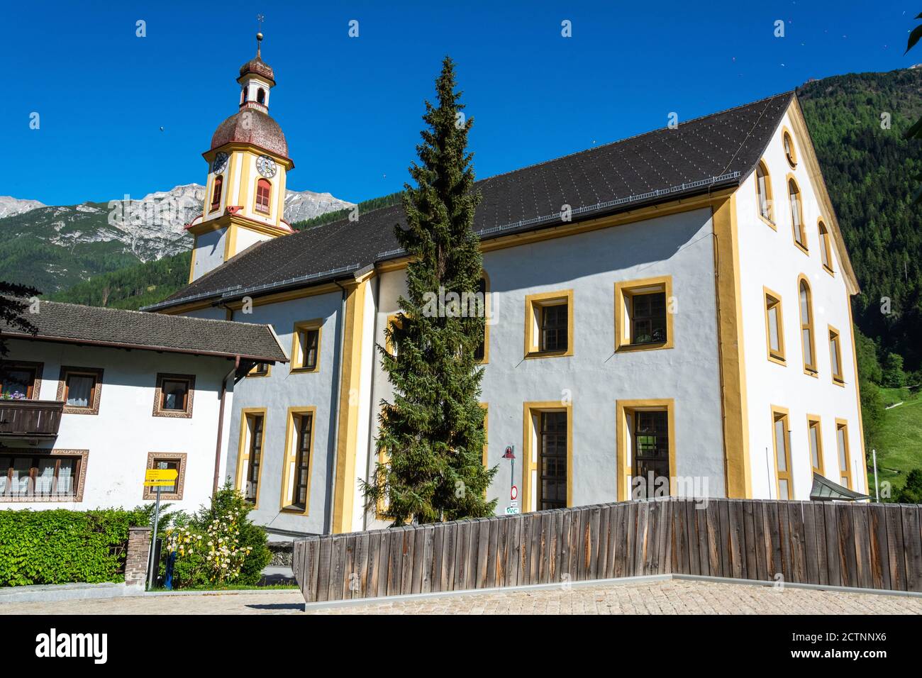 Neustift im Stubaital, Austria – May 27, 2017. Exterior view of the parish church Pfarre Neustift in Neustift. Stock Photo