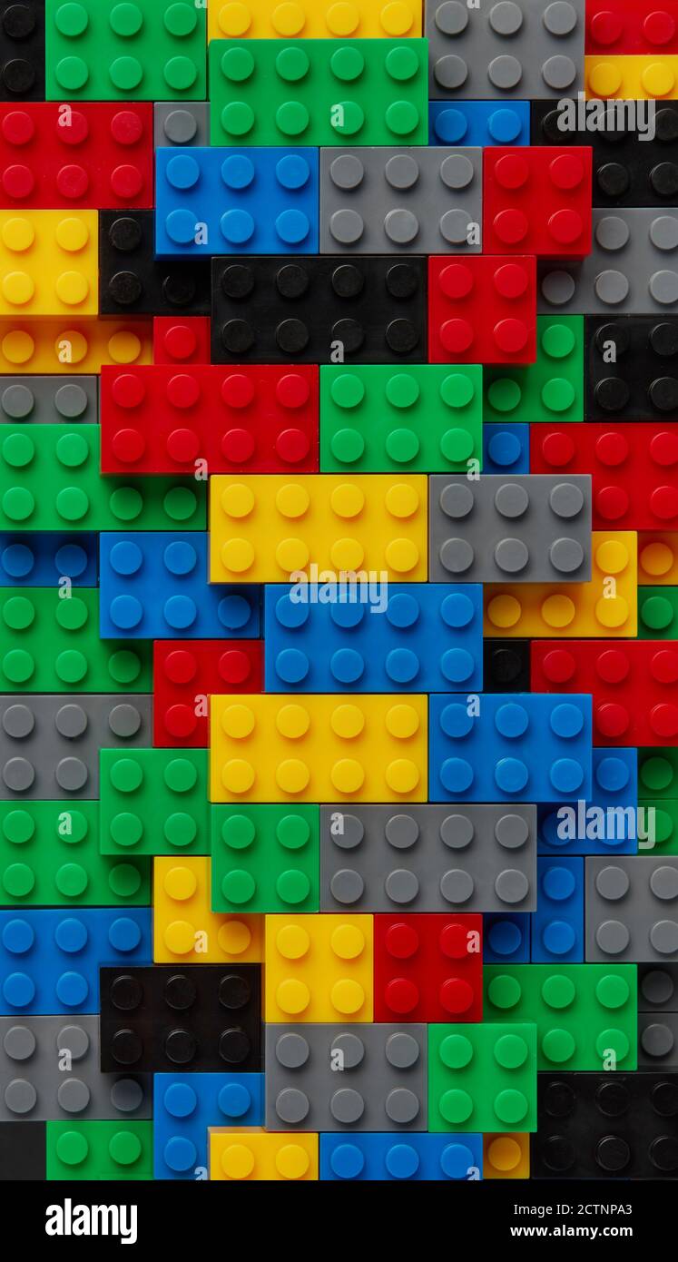 Plastic toy blocks on white background Stock Photo - Alamy