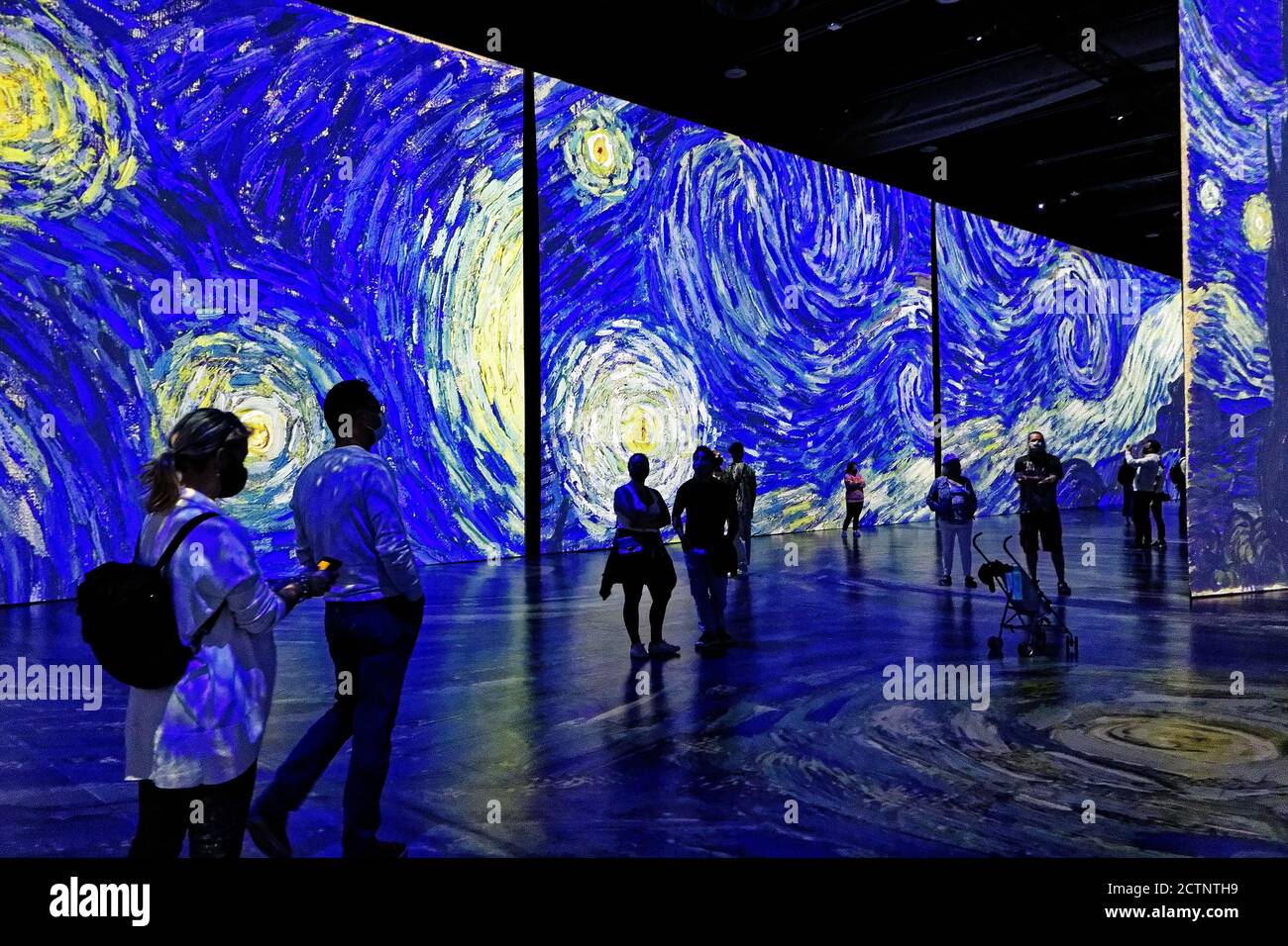 People at the Imagine Van Gogh immersive exhibition in Quebec City, Canada Stock Photo