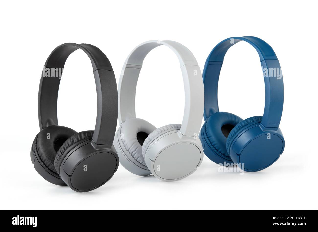 Wireless headphones on white background Stock Photo - Alamy