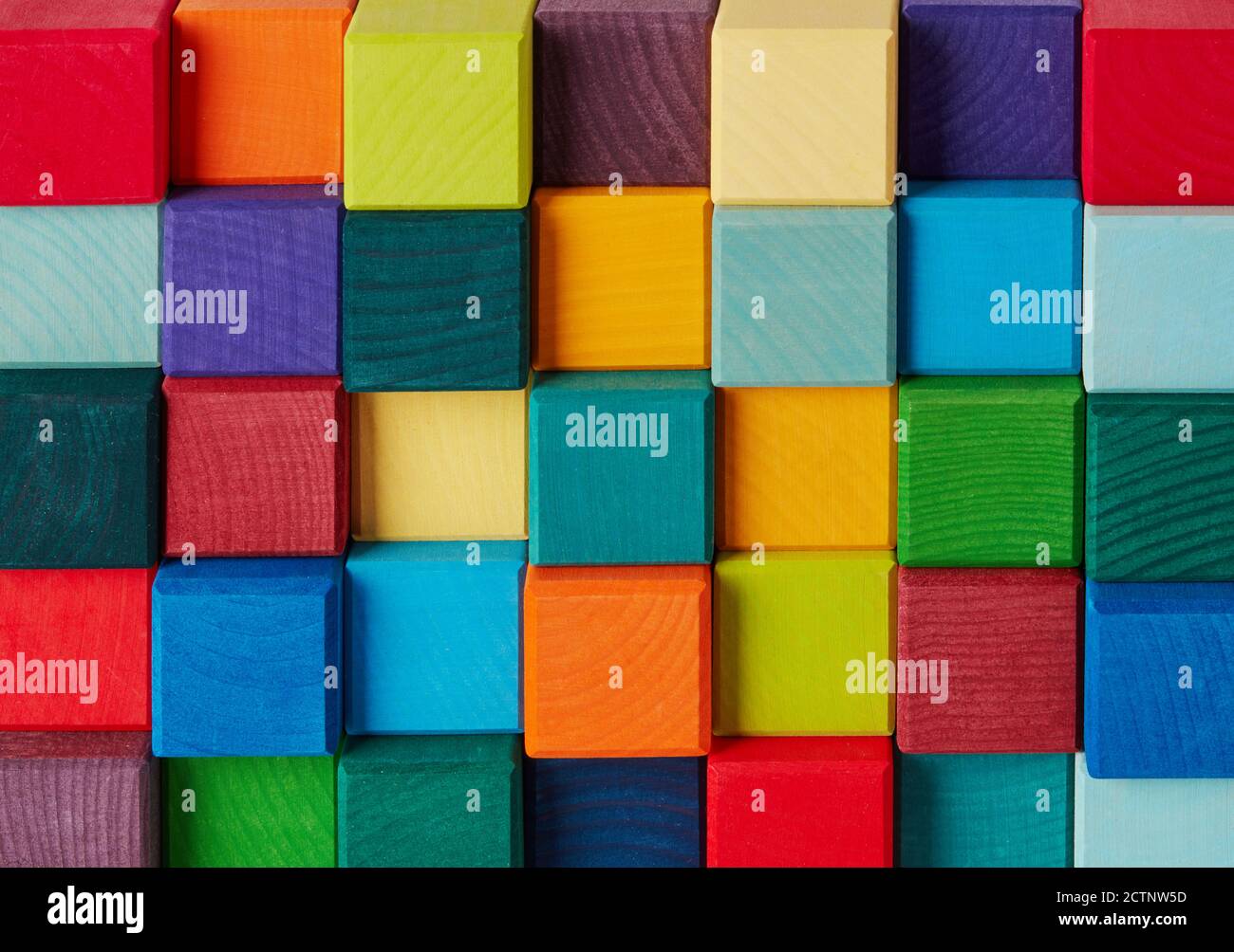 Multi-colored wooden toy blocks background Stock Photo