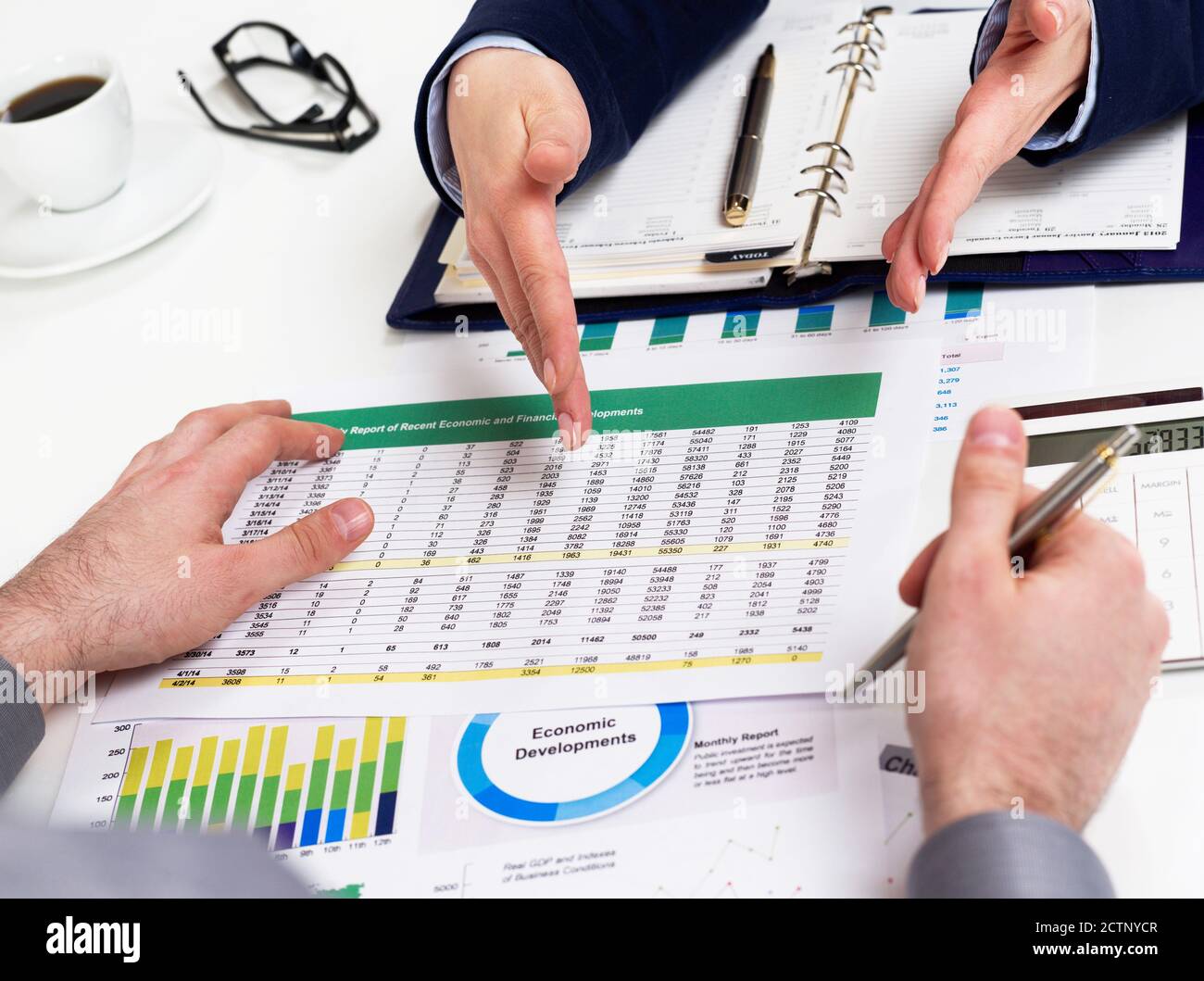 Business people working on financial data Stock Photo
