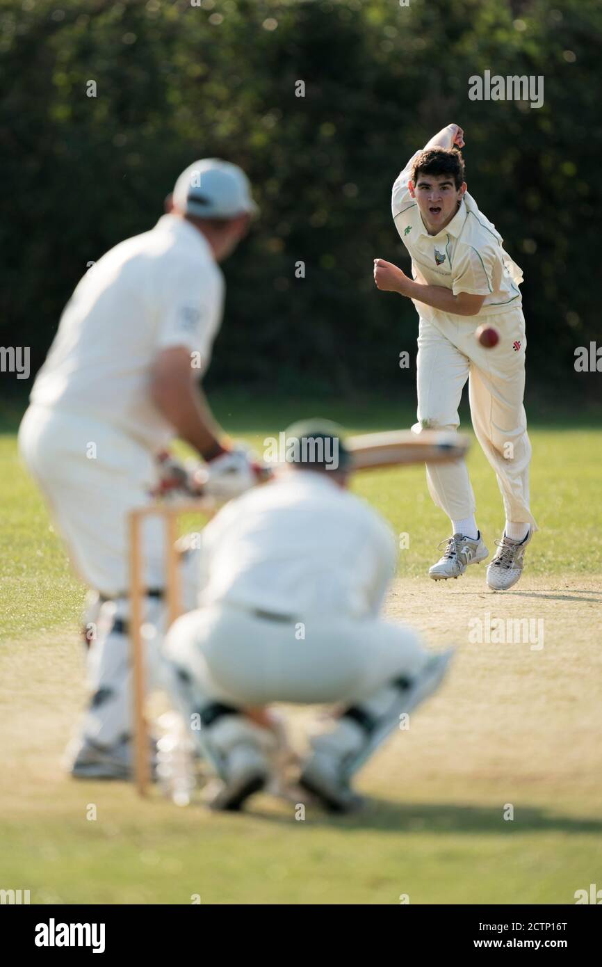 Bowler in action. Stock Photo