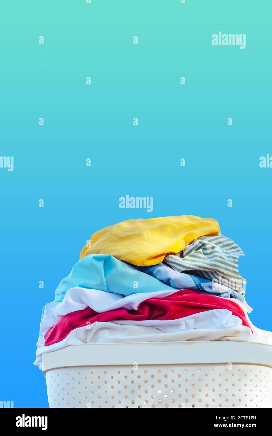 Laundry baske.on a blue background Stock Photo