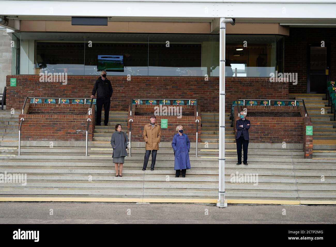 A general view of owners in the grandstand during day one of The Cambridgeshire Meeting at Newmarket Racecourse. Stock Photo