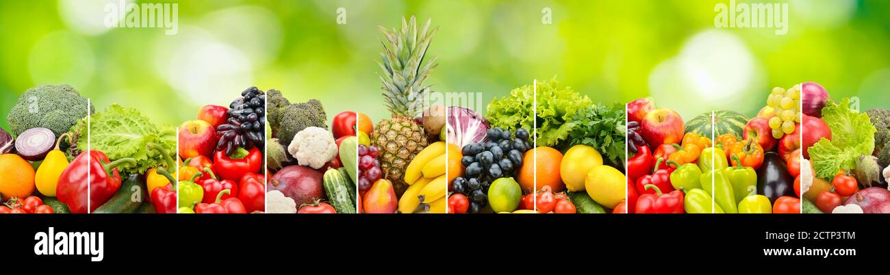 Fruits, vegetables separated vertical lines on green natural background. Stock Photo