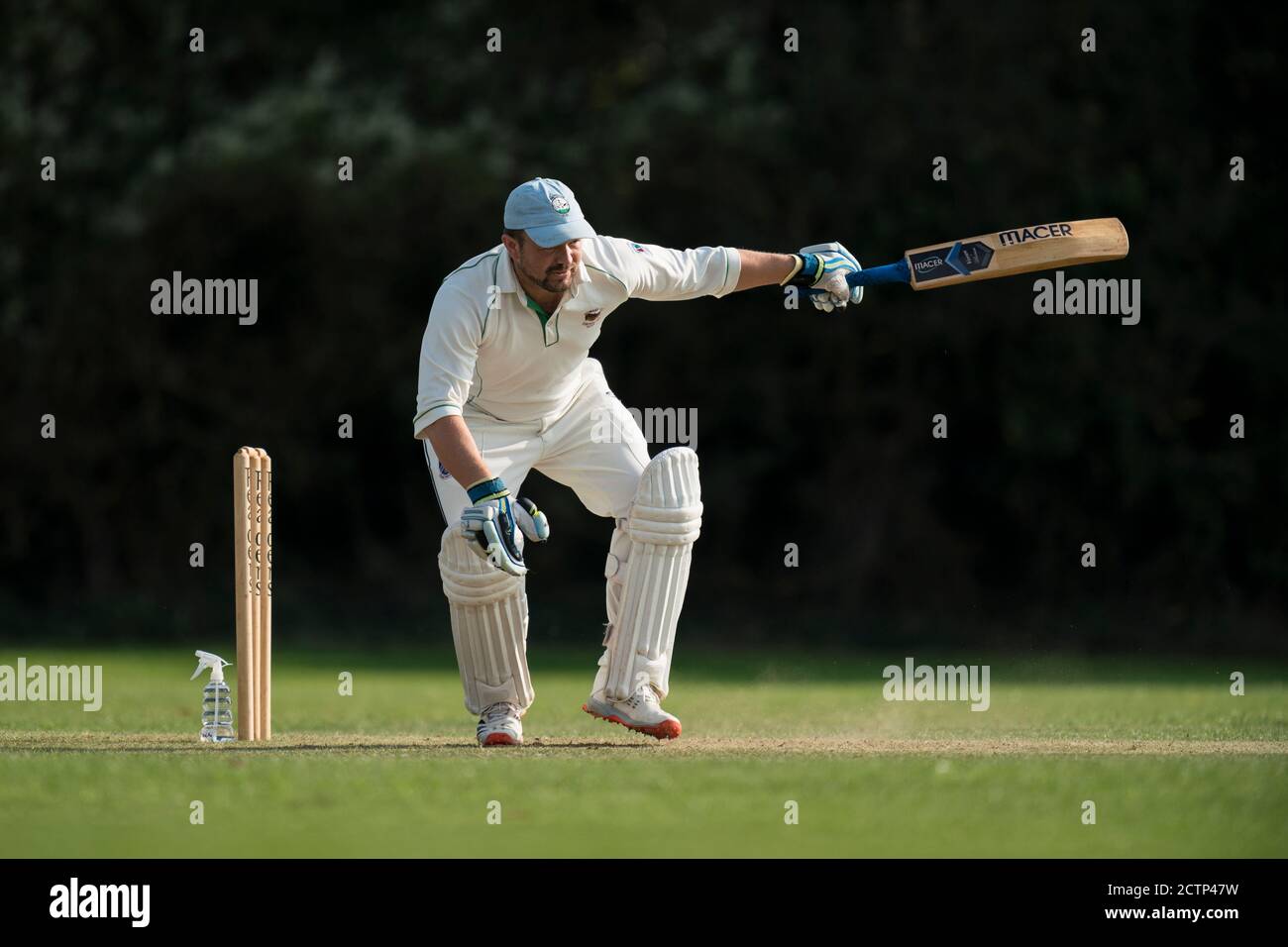 Batsman playing shot Stock Photo