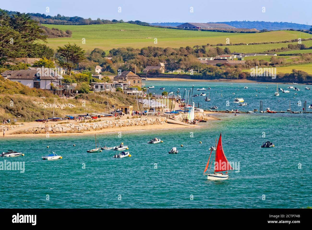 Rock village waterfront on the River Camel estuary, North Cornwall, England. Stock Photo