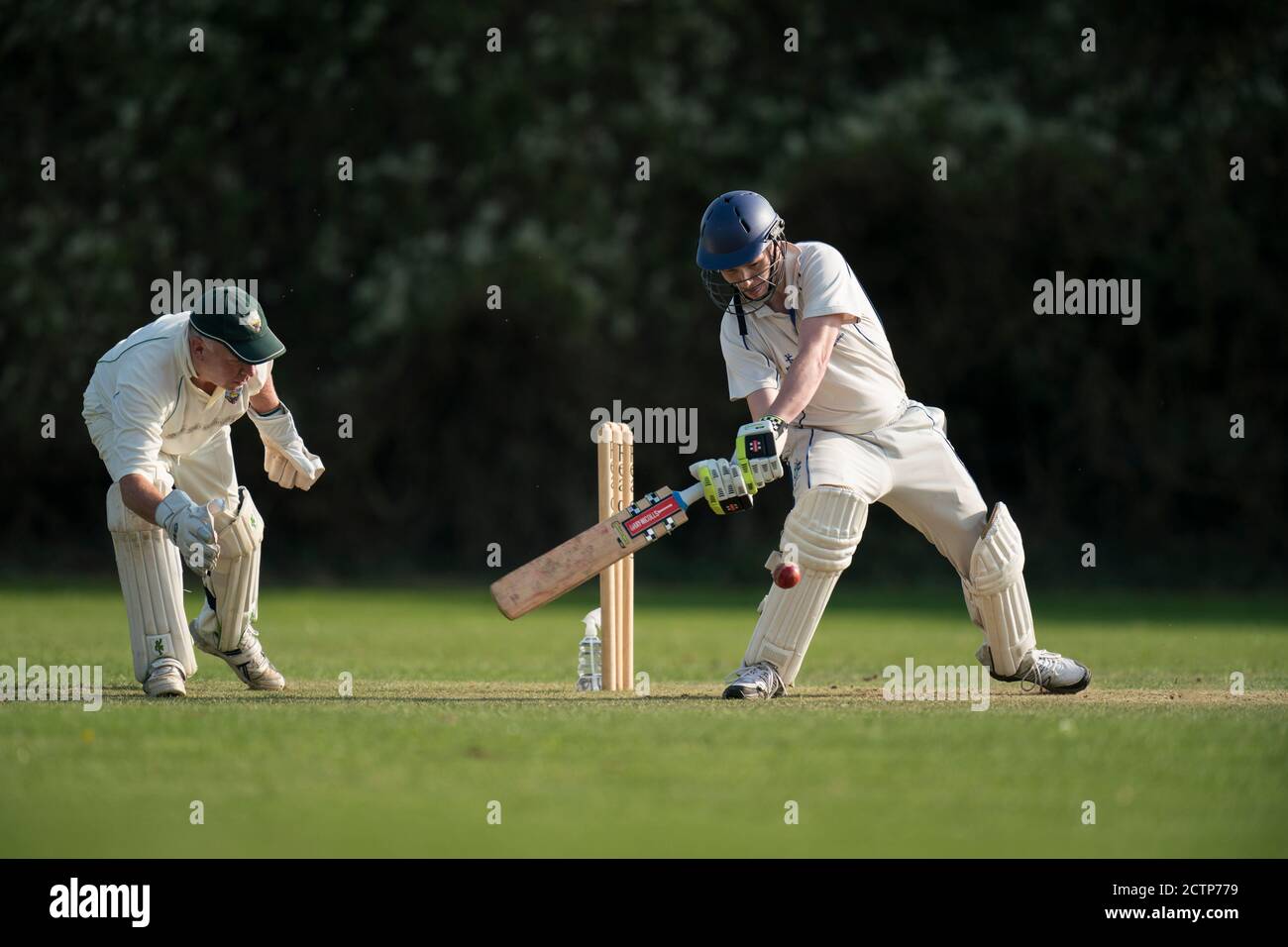 Batsman playing shot Stock Photo