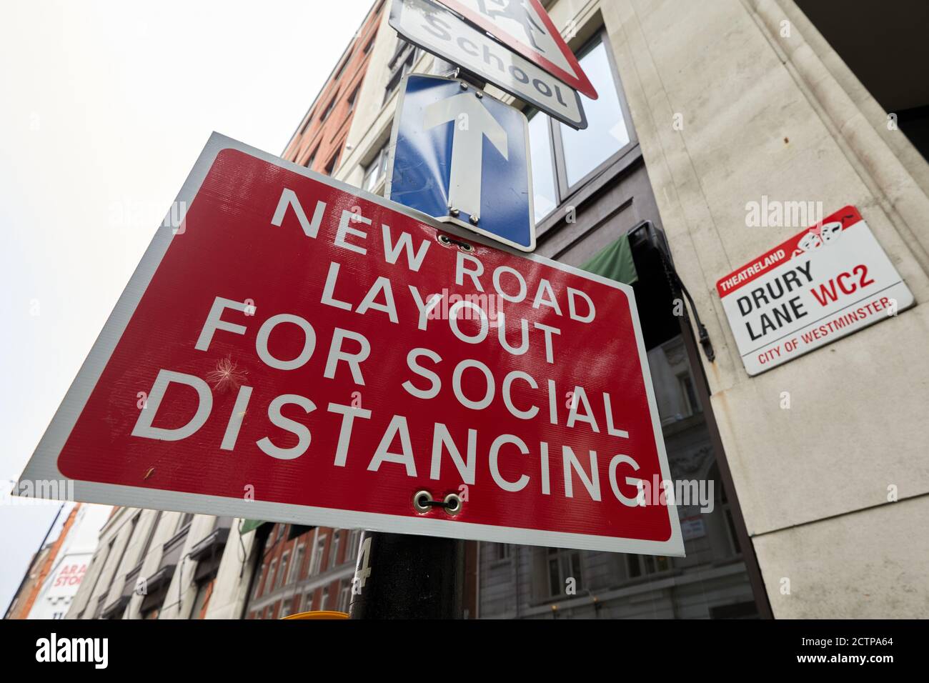 London, UK. - 21 Sept 2020: A street sign in Drury Lane warns drivers of new layout measures to help social distancing in the wake of the coronavirus pandemic. Stock Photo