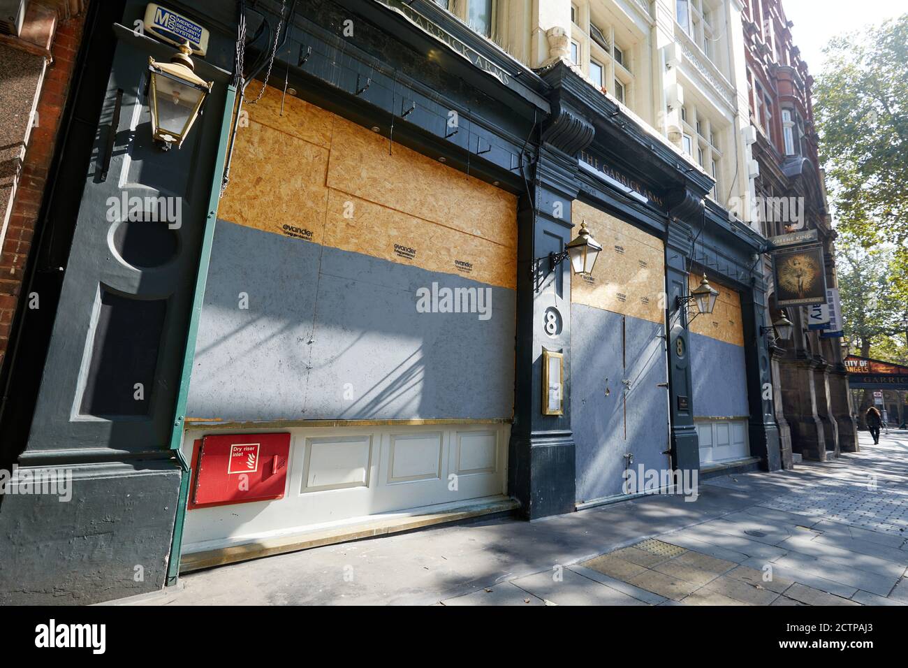 London, UK. - 21 Sept 2020: The boarded-up front of the Garick Arms pub on Charing Cross Road in central London. The Greene King pub has been shut since the start of the coronavirus pandemic. Stock Photo