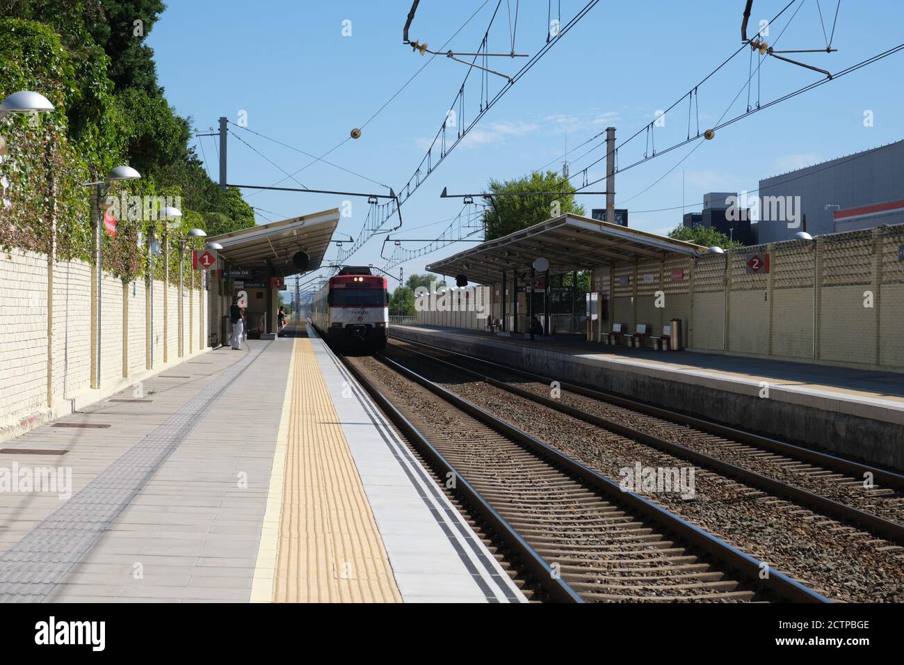 Madrid, Spain. September 11, 2020: Train arriving to the Alcala de Henares Universidad railway station. Stock Photo