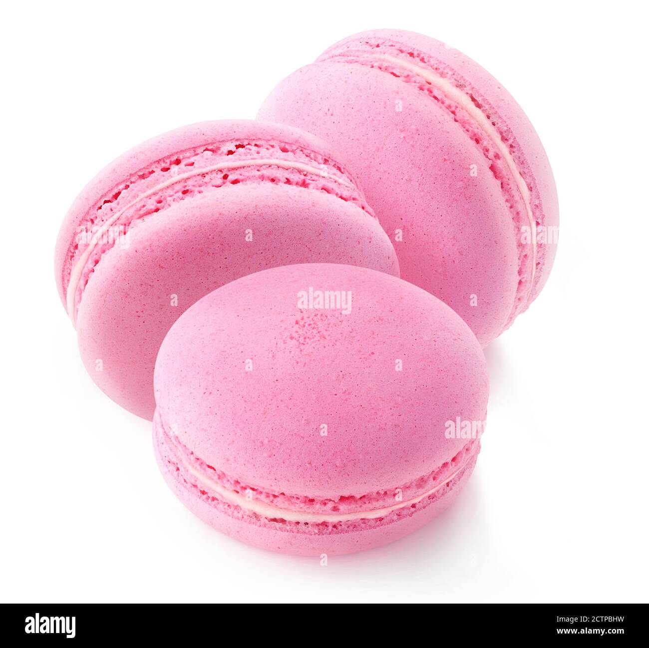 Three pink macaroons (strawberry or raspberry) isolated on white ...