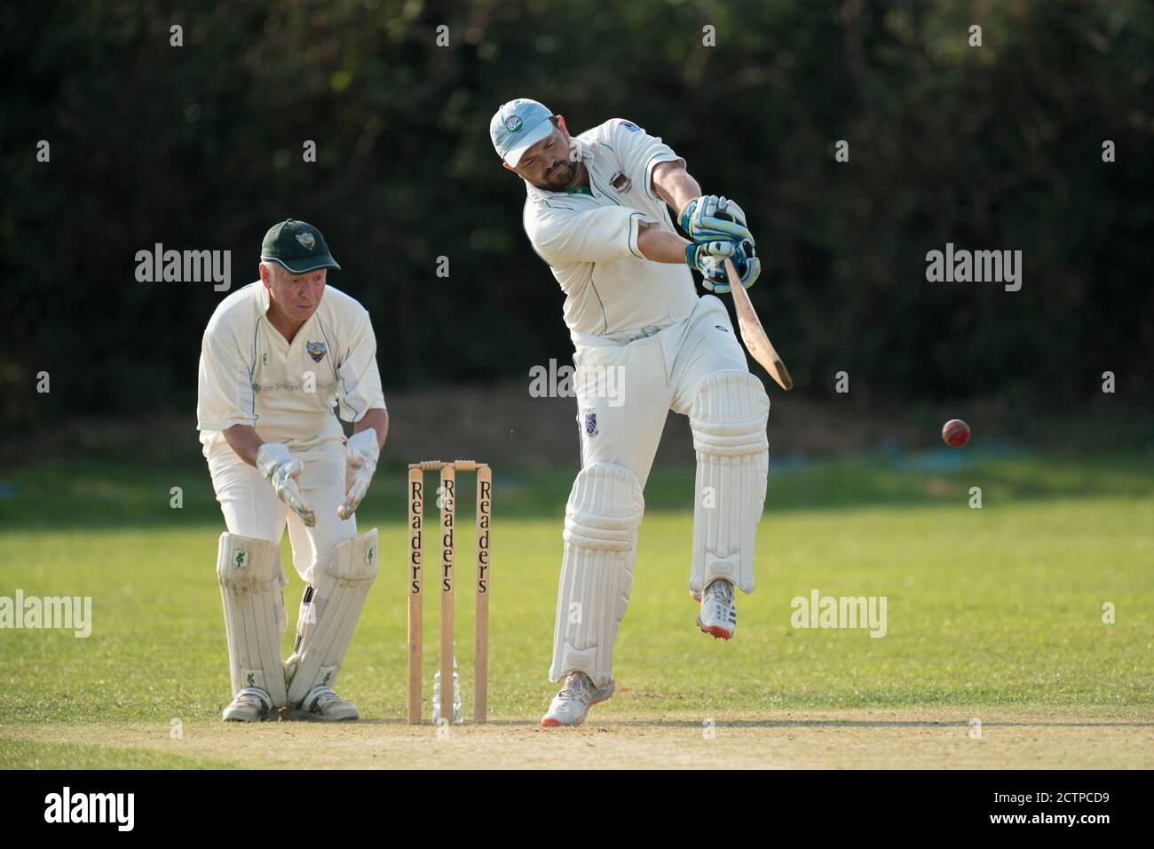 Batsman playing shot Stock Photo