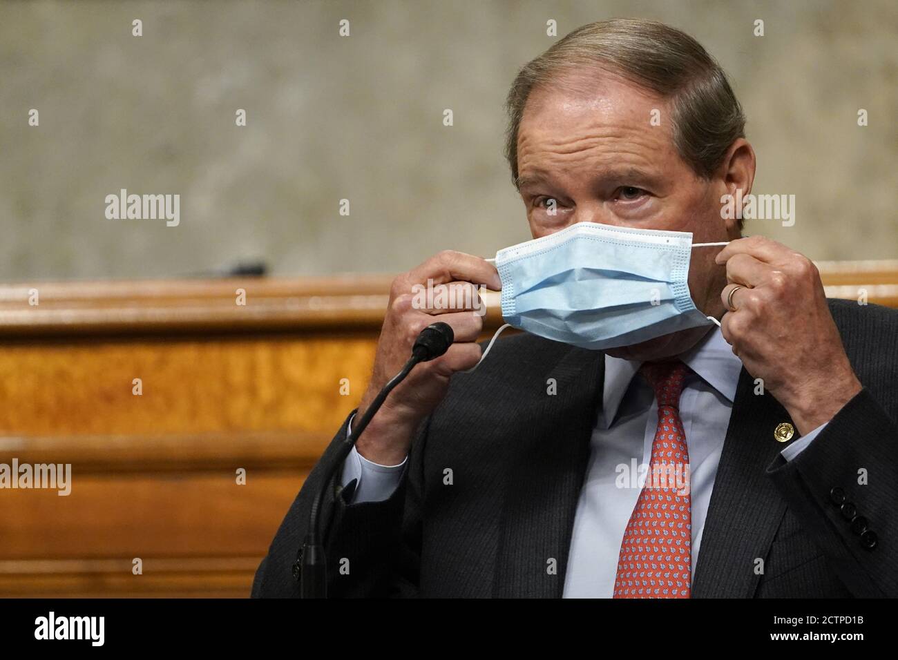 Washington, United States. 24th Sep, 2020. Sen. Tom Udall, D-N.M., puts on his mask after speaking during a Senate Foreign Relations Committee hearing on Capitol Hill in Washington, DC, on Thursday, September 24, 2020, during a hearing on U.S. policy in a changing Middle East. Pool photo by Susan Walsh/UPI Credit: UPI/Alamy Live News Stock Photo