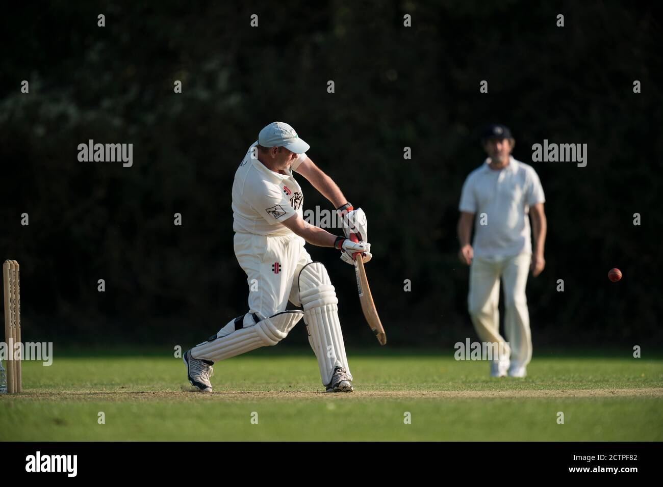 Batsman playing shot Stock Photo