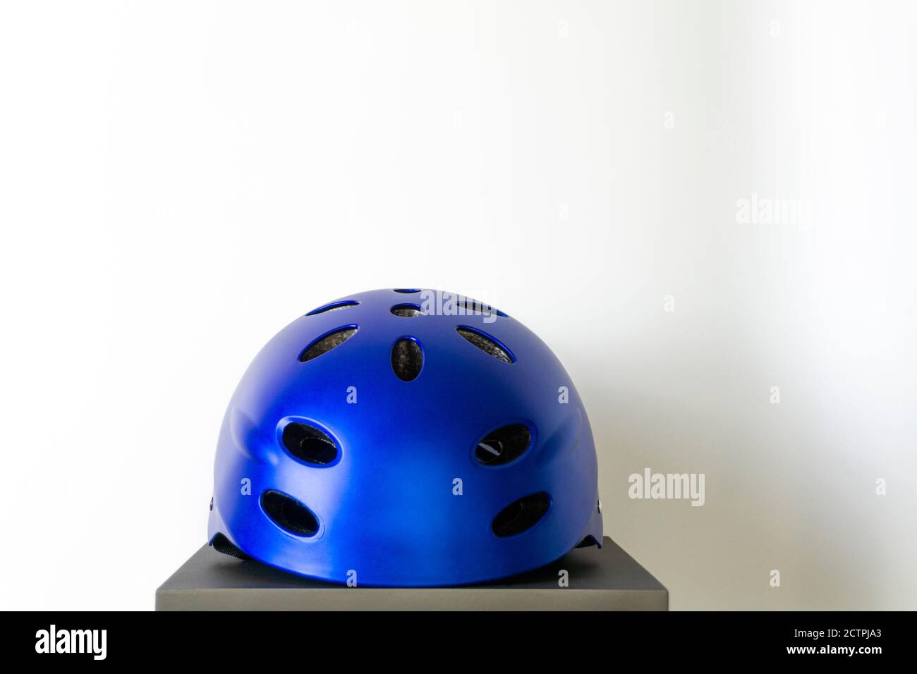 Blue plastic bike helmet hi-res stock photography and images - Alamy
