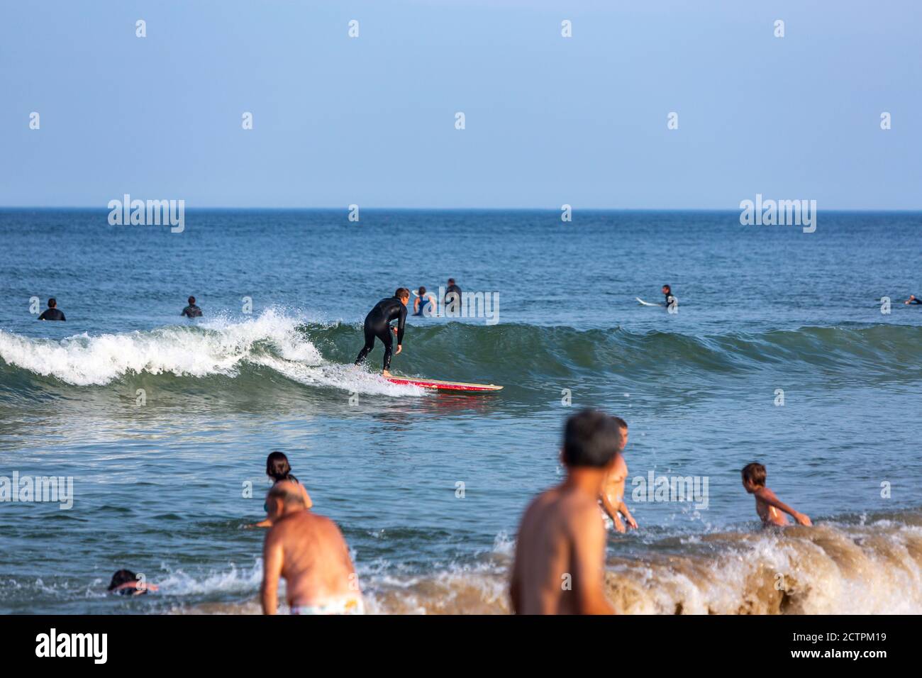Surfers in Marconi Beach, Eastham, Cape Cod National Seashore, Massachusetts,  United States Stock Photo